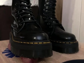 Chastity cage punishment: Dr Martens stilettos crush Groveler’s cock on the cockbox mat