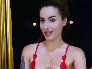 Small titted brunette Sharron with glasses masturbates